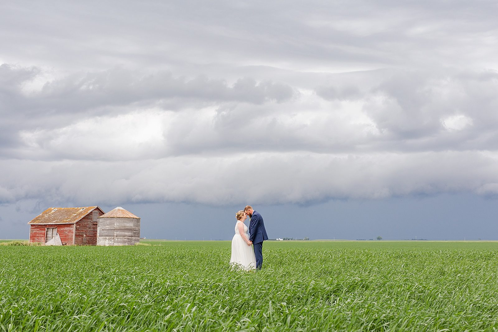Wedding couple with Saskatchewan sky