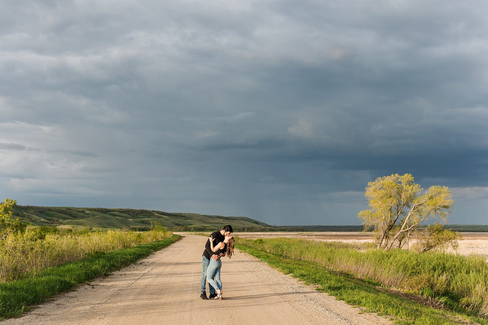 Buffalo Pound, engagement session on a dirt road
